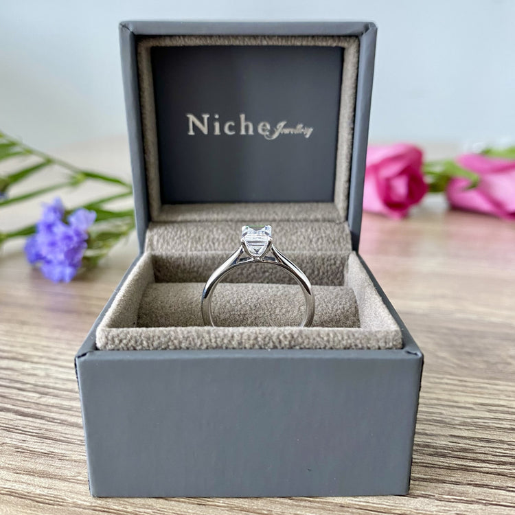 Emerald Cut Engagement Ring in Platinum Diamond 0.9ct F VS