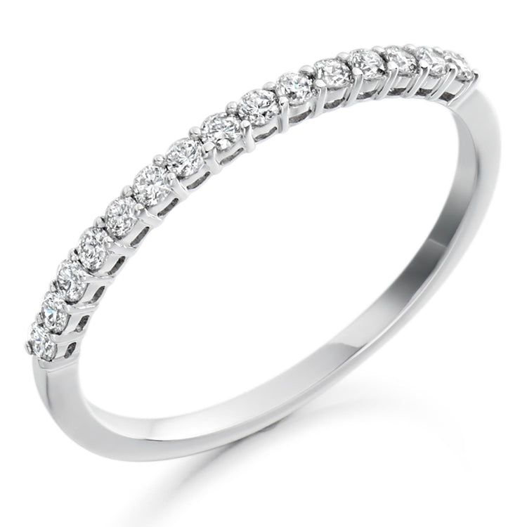 Round Brilliant Cut Claw Set Half Eternity Ring in Platinum